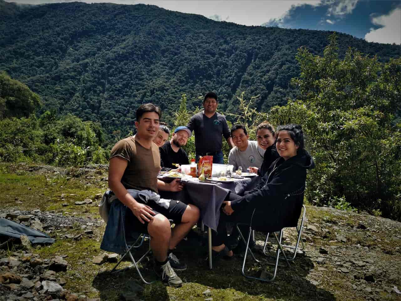 Travelers eat a delicious lunch in the Cloud Forest between Cusco and the Manu Biosphere