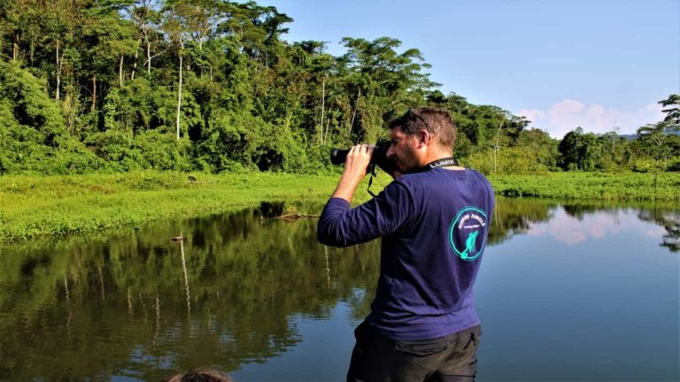 Traveler taking photos in the Peruvian jungle