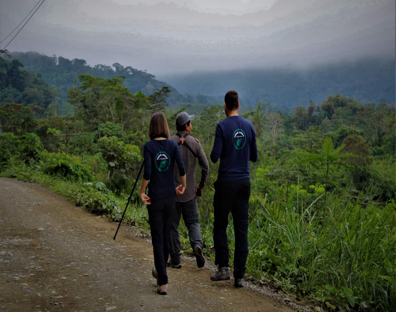 Travelers and Tour Guide on the lookout for animals